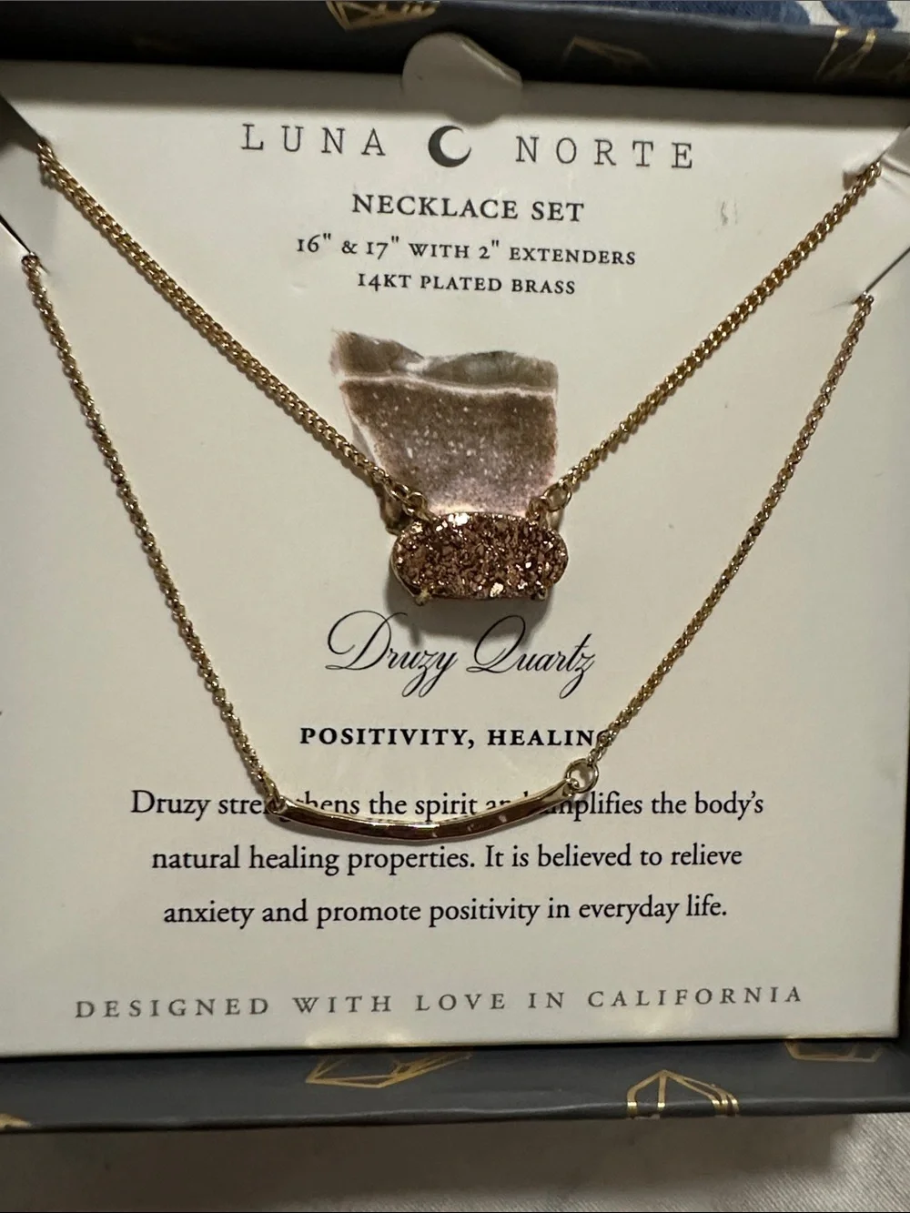 Luna Norte 14kt gold-plated brass layered necklace set features a sparkling